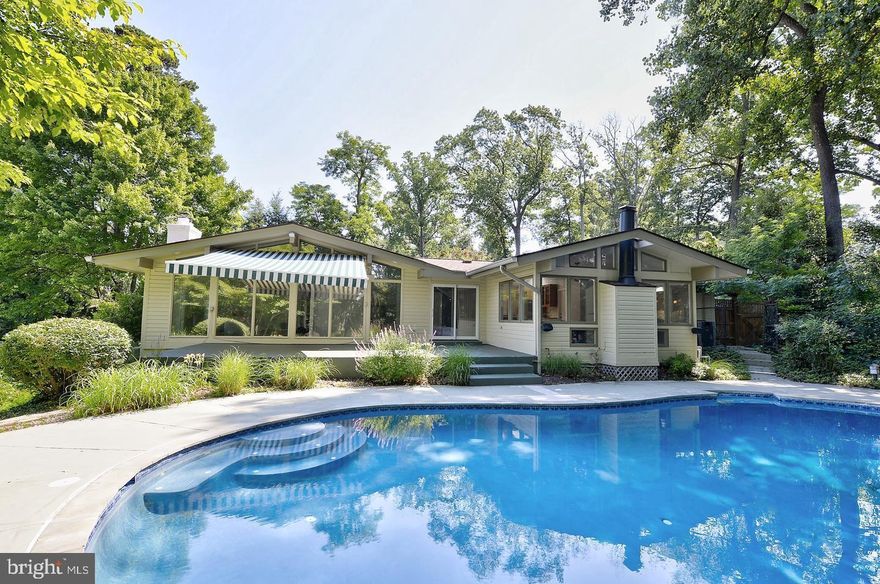 Set on nearly an acre in a quiet cul-de-sac in Bethesda’s highly sought-after Oak Forest neighborhood, this light-filled, California-style contemporary home offers 3 bedrooms and 3.5 bathrooms. The open-concept layout features a modern kitchen, three gas fireplaces, hardwood floors, and abundant skylights that fill the home with natural light.

The expansive, private lot is truly exceptional, complete with a circular driveway, saltwater pool, tennis court, gazebo, and storage shed—ideal for outdoor entertaining, relaxation, and everyday enjoyment. The spacious primary suite includes a walk-in closet and a serene private outdoor retreat.

The walkout finished basement adds valuable living space with a large recreation room, wet bar, laundry area, and generous storage. A two-car garage includes additional storage and is equipped with an electric vehicle charging station.

Ideally located inside the Beltway in the Walt Wittman school district, this home offers convenient access to downtown Bethesda, shopping, dining, and Metro, with easy commuting to Washington, DC, Virginia, and major thoroughfares.