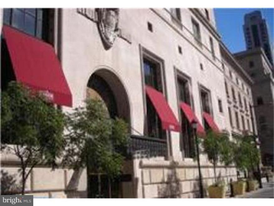 Perfectly Situated between Rittenhouse Square and the Avenue of the Arts this corner 2BR, 2 Bath residence offers a great location and splendid skyline views. Oversized windows facing South and East along with 9 ft. ceilings allow this unit to be flooded with great natural light.  Both bedrooms are well proportioned with one featuring an en suite bath.  There are Brazilian cherry hardwood floors throughout and a spacious kitchen with SS appliances and granite counters overlooking the living and dining areas.  Around the corner from your front door is the newly developing Dilworth Plaza scheduled to open in Sept. 2014 and planning to include a caf , fountains, public art, an ice skating rink and green space.  Discounted parking is available next door in a public garage and steps away are the city's best restaurants, theaters, nightlife and shopping.