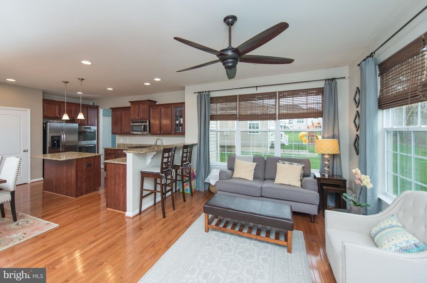 Don't pay high new construction prices as this K.Hovnanian home is gorgeous from top to bottom & BETTER THAN NEW. This stone front 4 BR 2.5 BA, 2 car garage w/ full basement features extra bump outs, upgraded kitchen w/  island, hardwood flrs freshly painted walls. Since new, owners have added additional hardwoods, tiered deck & more. This home is the 1st resale in the community. JUST 3 YEARS OLD!