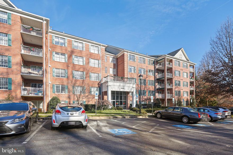 Welcome to this impeccably maintained 2-bedroom, 2-bath condo with a den. The den has a closet and a window with plantation shutters. As you step inside, you'll be greeted by gleaming hardwood floors that flow throughout the home. A spacious kitchen with abundant cabinet and drawer space leads to a cozy breakfast area with bamboo hardwood floors and access to a patio overlooking the woods. The primary bedroom offers comfort with its plush carpeted floor and a spacious walk-in closet. The primary bathroom is an absolute show-stopper. It has been fully renovated with a large vanity, glass-tiled walls, and a heated stone floor. The second bedroom is generously sized, with a large closet and cozy carpeted floor. The second full bath is well-appointed, with a tub/shower combo and stylish tile flooring. Convenience is essential with an in-unit utility room with a washer and dryer. This home is move-in ready, offering a perfect blend of style, comfort, and functionality. Don't miss the opportunity to make this your dream home!