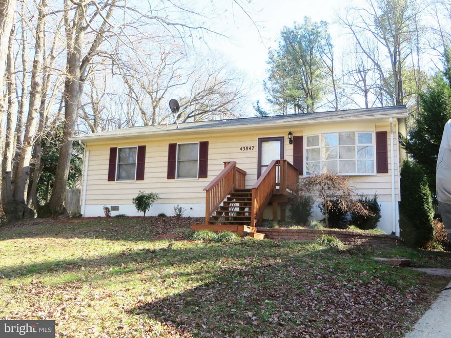 Nice rambler on 1/2 acre in Hollywood, at end of a quiet street. LR, DR, BIG family rm addition w/laminate floor & pellet stove. Kitchen w/smooth-top stove & built-in microwave. Bedroom, full bath, walk-in closet in lower level works well as master BR; three more BRs and full bath on main level. Deck, shed & fenced back yard, enlarged driveway for extra parking. 3rd-party approval required