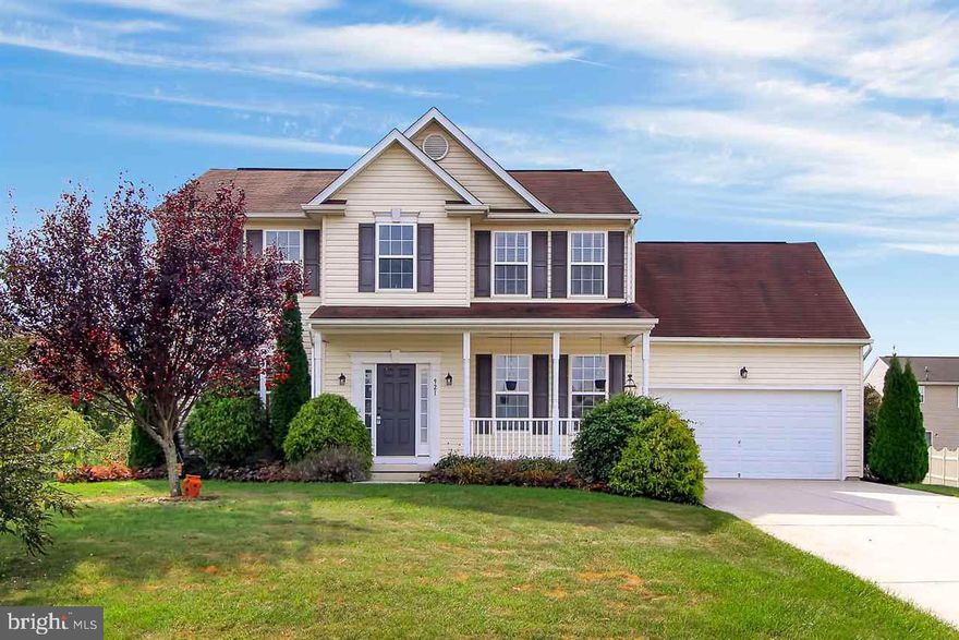 This beautiful colonial has all the features you want. Beautiful hardwood floors, granite counter tops, open stairway, stone fireplace in family room, and finished basement and more. Master suite has sitting area and huge walk in closet. Relax on the 14 x 26 rear deck with retractable awning. Great neighborhood and convenient to major highways. Nothing to do here, just move in and enjoy!