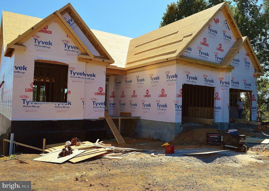 Under Construction. This Beautiful Rambler includes Brick all the way across the front except for the two middle eaves, Foundation - all brick, unfinished basement with a bathroom rough in, gas oven range, 2 car garage, Granite, stainless steel , Hardwood floor in foyer, kitchen, great room, and dining room. Please see documents for additional information.  Call for more information.