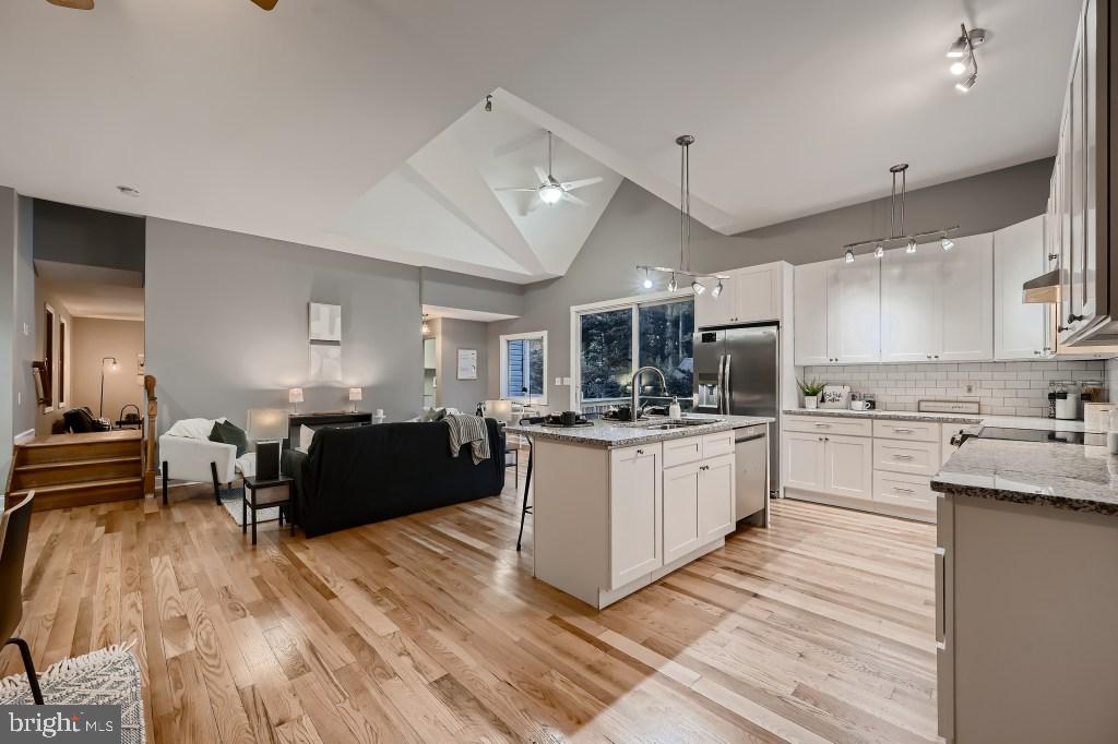 Best and final offers due Saturday 12pm. Priced to sell! Last Opportunity to own this home. Situated in a quiet enclave and within walking distance of Little Round Bay. This custom home is a turn-key gem. The light filled, open-concept design features a gourmet kitchen, stainless steel appliances, upgraded countertops, wood flooring, new furnace, and air conditioning. Conveniently located in Herald Harbor just minutes from downtown Annapolis, I-97 and route 50. Enjoy a scenic 20 minute boat ride to Annapolis City Dock and all the shops and restaurants! This beautiful home is a must see and priced to sell! Herald Harbor features several community beach areas, a boat launch, hiking trails, community center, day care facilities, convenience stores, and restaurant.