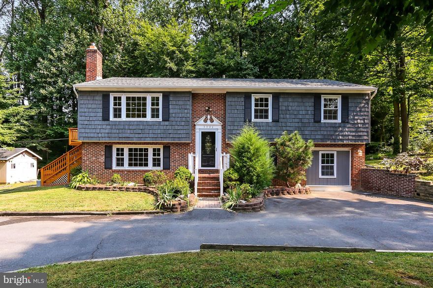 Nestled in Fairfax city near downtown, this gem of a house is full of charm and beauty!  From the  cu de sac you will immediately see the oversized driveway on a lot that is a .75 acre oasis!  The house is freshly painted and offers loads of light and space inside.   Features include an updated kitchen with ss appliances that opens up to a newly repainted deck; updated bathrooms, recessed lights, main level office, generously sized upper and lower level family rooms and a lower level kitchenette with a walk out sliding door to the back yard.  Very close to Fairfax High School and minutes to the heart of Fairfax City with shops, restaurants, family events, GMU and Army Navy Country Club!