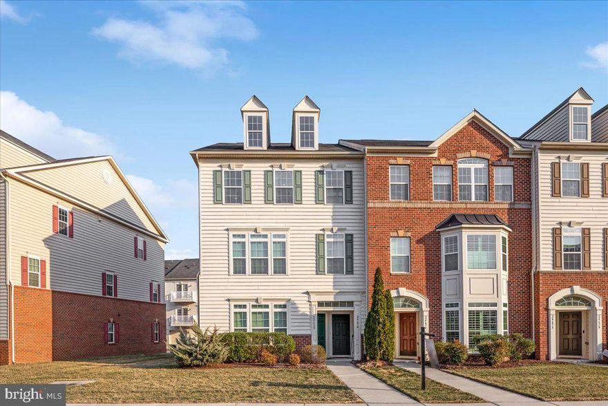 Welcome home to this stunning top-floor unit, offering exceptional space, soaring 9+ foot ceilings, and an abundance of natural light coming in. Designed for modern living, the open-concept floor plan seamlessly connects the living room, dining area, and kitchen—perfect for both relaxing and entertaining. The gourmet kitchen features granite countertops, a large island, stainless steel appliances, and recessed lighting.
The spacious primary suite features an elegant tray ceiling, a private balcony, and a large walk-in closet. Additional highlights include newly installed carpet, a one-car garage and meticulous maintenance by the current owners.  Enjoy fantastic community amenities, including a playground, pool, clubhouse with a gym, and easy access to Route 50 and Loudoun County Parkway, with plenty of shopping, dining, and everyday conveniences just minutes away!  Don’t miss out on this gorgeous home, with plenty of overflow parking for your guests — schedule your showing today!
