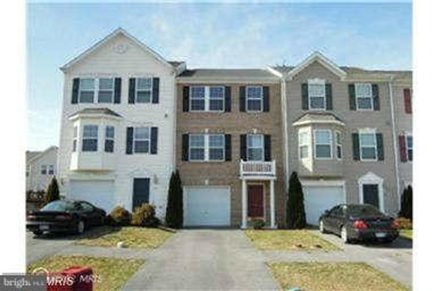 Completely renovated 2280 sq ft Townhouse in Manor Park. new hardwood, ceramic tile, stainless steel appliances,new lighting, deck and paint. 4 bedroom and 3 /2 bath. Upgraded master bath with soaking tub. Upgraded Cabinetry, stainless appliances and 1 car garage with opener. Hurry wont last long with 4 bedrooms!