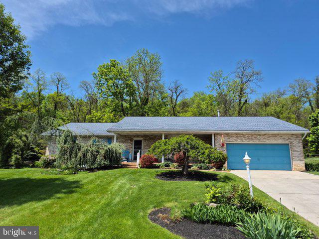 MOTIVATED SELLER!!
Spacious luxury ranch home featuring 3 1/2 baths, hardwood floors. large eat-in kitchen with stainless appliances, quarts counters and handcrafted cabinet unit/pantry. 1st floor laundry, family room off kitchen with skylights, fireplace and french doors opening to screen in patio, private cement patio and overlooking a beautiful mountainous ridge. Main floor boasts a primary bedroom with bath and 2 additional bedrooms, plus additional 1 1/2 baths, The partially finished basement includes a large family room, full bath and provides lots of storage space, Don't forget the 2 car attached garage and long covered front porch for morning coffee.