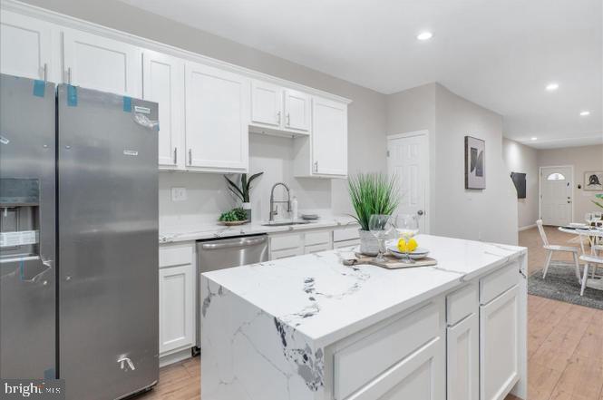 ***MMP plus Seller Asst = Low Down*** Charm City living at 2782 The Alameda, a newly renovated Interior Row/Townhome where timeless charm meets urban convenience in one of Baltimore’s most beloved neighborhoods. With over 1,900 square feet of finished living space, this home offers four spacious bedrooms, two full bathrooms, and a convenient laundry room, all designed to enhance your daily life. Spacious and sun-filled rooms with original hardwood floors. Updated kitchen with modern appliances and granite countertops. Finished basement ideal for a rec room, home office, or guest suite. Private backyard perfect for entertaining or relaxing. New HVAC, roof, or windows. Located just minutes from Lake Montebello, Morgan State, and shopping at Northwood Commons, you’ll enjoy both tranquility and easy access to the best of Charm City living. Nearby parks and green spaces, including Herring Run Park and Clifton Park Golf Course.