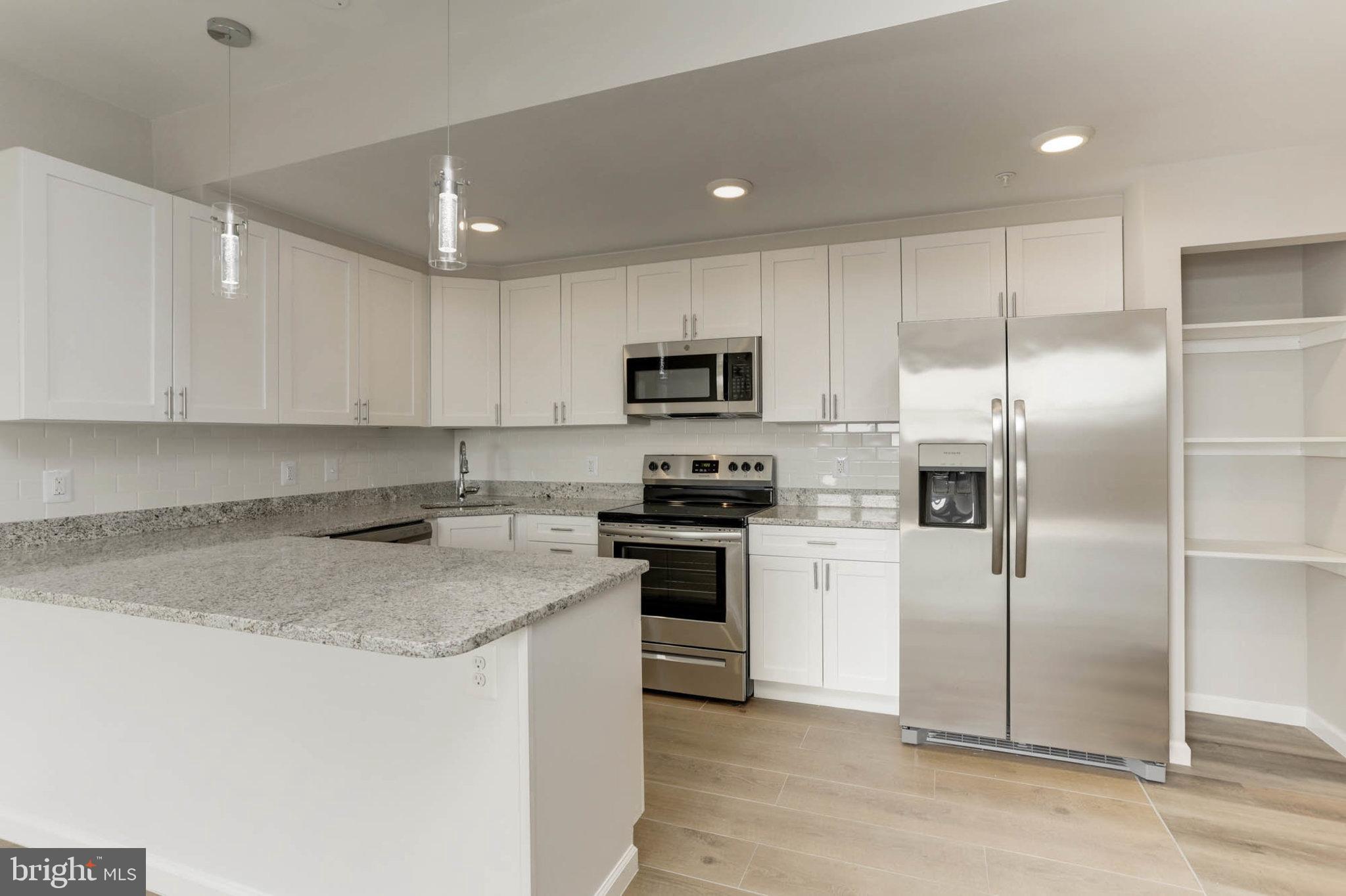 Updated appliances, bathrooms, kitchen - from the floor to the ceiling, everything is newer and up to date! A modern look on the inside and out, these apartments boast stainless steel appliances, upgraded cabinets, pendant and recessed lighting, granite countertops, luxury flooring, upgraded baths, and stunning views! Conveniently located across from John's Hopkins East Baltimore Medical Campus, it's a perfect place for resident students, staff, or anyone looking for a new, modern, conveniently located place to live! Make an appointment today!