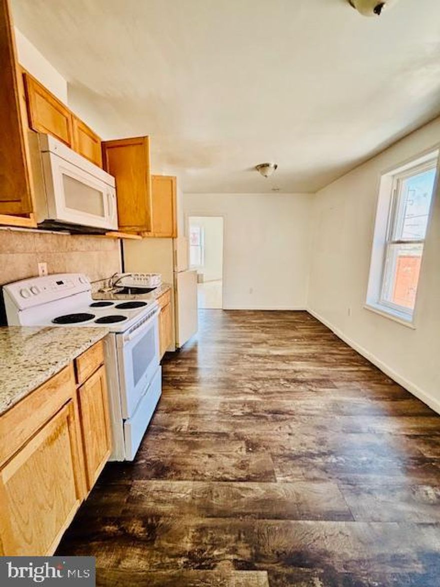 Charming, newly renovated 2-bedroom apartment on the 3rd floor, freshly updated with modern finishes and move-in ready, conveniently located near public transportation.