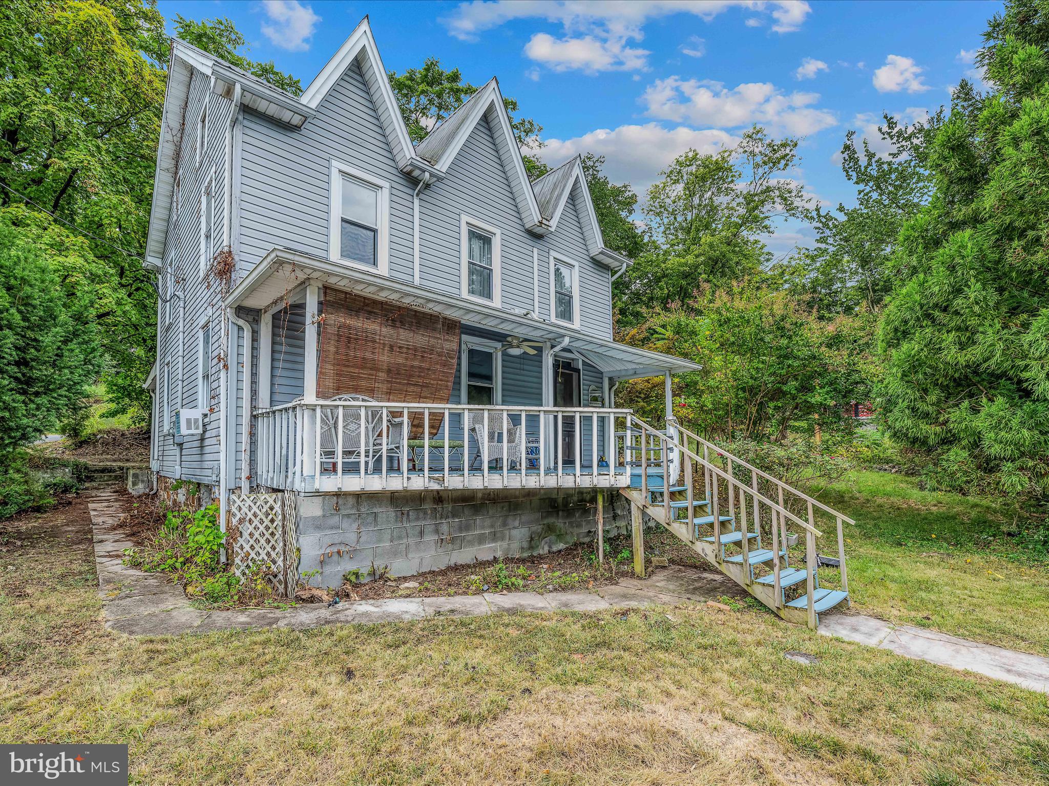 Charming home in a great location, close to downtown Berkeley Springs. Partial wood floors, three bedrooms and one full bath. Formal dining room and nice sized kitchen. Covered front porch to enjoy sitting out on. Good sized bedrooms upstairs and an attic and basement for added storage included. Come set up your appointment to see!