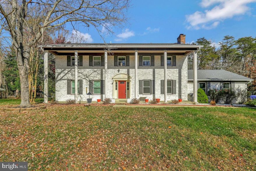 Your private retreat awaits! Discover peace, privacy, and modern comfort in this beautifully updated brick-front colonial nestled on 3 tranquil acres in a quiet Hughesville cul-de-sac. Enjoy a newer roof, windows, gutters, HVAC, sealed driveway, and a renovated epoxy-floor garage. The updated kitchen showcases granite counters, an oversized island, and soft-close cabinetry, perfect for entertaining. Upstairs features four spacious bedrooms, including a primary suite with sitting area and walk-in closet. Step outside to your fully fenced backyard oasis with a deck, stamped concrete patio, and sparkling in-ground pool. Multiple sheds and fresh landscaping complete this rare find!