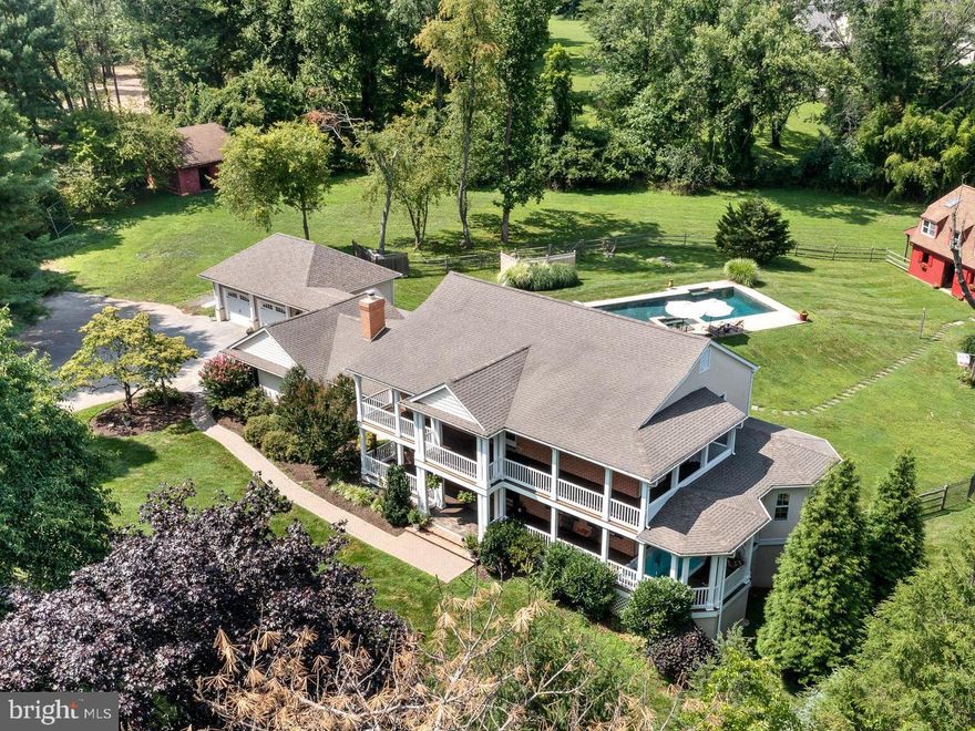 Cozy compound in protected Radnor Hunt w/peaceful privacy -this estate is more than just a house!  Many  amenities lets you "Staycation"-  Saltwater Pool/Spa, 3 + stall Barn, Guest House w/Laundry & full Bath, & large SwimSpa for year round exercise & relaxing! “Own your View" on 6 acres, 2/3 are mature woodlands w/ your own trail system.  A clean "Palette" ready to add on or keep small - Open flexible Floorplan, inc. 2 MBRS, one on 1st flr.  Desirable Location - mins. to Paoli train yet calming, quiet in the country! Sit on charming wrap around mahogany floored Porches & you'll see why they were added - ENJOY view of Bucolic setting w/ Conserved "Open Space" across Davis Rd.  Very cozy home offers so much, & was Sold, but Buyer backed out - so inspections done, repairs made, Hdwd. flrs refinished on 1st floor, lots of fresh interior painting done, & new septic system installed.  Custom Pool & Spa(updated to salwater & phone app controls) Sit & sip in the Pool on the long steps on both sides of Spa.  EZ Hack to  Radnor Hunt Club & Indoor Ring & miles of trails.  Don't ride yet? Lease the Barn to a local- they''ll train you & show you the trail system!  In an area where land is hard to find - 2 "tear downs" on Jaffrey Rd (that runs parallel to Davis Rd.) just sold $1.25 & $1.15 mill. &  were only 3 acres - this is 6! It's Rare to have so many amenities- in this Location- for this price!  Newer Chef's Kitchen that's open to  big Breakfast Rm or Great Rm -w/ cathedral ceiling, skylights, ceiling fans, nice natural light from 3 walls of windows & views of the Pool & Barn.   Cozy Den w/ FP,  2 Laundries, remodeled Baths, fabulous Sunroom/Office that opens to Swim/Spa on front Porch .  Recent Updates: HVAC, Roof, Windows, Electric, & auto start Generator.  Spacious Kitchen is the heart  of this home, w/ honey glazed cabinets, granite counters & island w/ seating.  Cooks can spread out in this space w/ stainless steel appliances & gas cooktop. Wonderful  natural light bounces off the gleaming refinished Hdwd. Floors on main level.  Excellent flow has Door from KIT & Den to big Deck that's perfect place for grilling, even handy gas line. NEW PAINT in  Den has created a bright space- so much better than the dark wood! Recessed lighting, walls of sfireplace & handy blt-in wood storage.  Back Hall has Guest Suite/1st flr. MBR w/ 2 W/I closets, plantation shutters, & deluxe Bath w/radiant floor heat, marble vanity,  & large shower.  In this wing is a Powder Rm, Laundry Closet, & door to breezeway to oversized 2+ Car Garage & many blt-in storage shelves.   Main level also has Sunroom, Office, Dining Rm, & Living Rm.  2nd flr. Spacious MBR  w/ hdwd/ flrs, newer Bath w/ marble floor & shower,  & good sized W/I Closet. Down the hall are 2 BDrms w/ french doors to Porch & spectacular views of conserved ground & sunrises across Davis Rd.  5th BR is next to Hall Bath w/ 2 sinks, linen closet, &  tile floor & tub surround.  Lower Level has big Playroom w/ Pool Table, full Bath, 2nd Laundry &  O/E to fenced yard & Pool.  3+ stall Barn has Tack Rm. - no ponies or goats? Make it a Party Barn! Upstairs are 3 Rooms, Laundry, & full Bath- perfect for Guests,  Studio, or Kid Cave! Another  2+car GAR w/ stairs to a hayloft.  Even an  Auto Start Generator  & RV Parking Pad w/ Electric Hookup for traveling friends - who may never want to leave!   Take back roads past breathtaking views & Open Space- @ 35% of ground around here is "Protected" from development.  See documents for floorplan, plot plan...  Mins. to Paoli Train,  Main Line,  Airport, & some of best Clubs, Schools, Shopping & Dining - checks a lot of the boxes on your "Wish List"! NICE PRICE ADJUSTMENT - lets you pick carpets or hdwd. flrs upstairs!