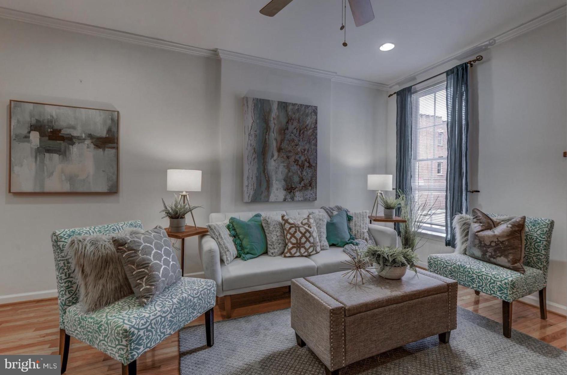 This three bedroom townhome has two full bathrooms and one half bathroom on the main level. This charming home located in the heart of Upper Fells Point has recently been renovated with new fixtures, paint, flooring, and more. Walk through the open-floor-plan main level into the living room; there is a half bathroom off of the living room for convenience and towards the back of the home you will find the kitchen and dining room. The second level has two very large spacious bedrooms and one full bathroom that is located off of the hall. The third level has an owners suite with 12 foot high cathedral ceilings, a full bathroom, and roof deck access off of the third level hallway. The basement offers a large area for storage and includes the washer and dryer. Immerse yourself in city living as this home is conveniently located five minutes from Patterson Park, five minutes from Fells Point waterfront dining and shopping. Additionally, located five minutes from Johns Hopkins Medical Center, and only 10 minutes from downtown Inner Harbor. The Target and Harris Teeter shopping center are a short drive away as well.