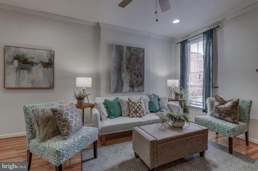 This three bedroom townhome has two full bathrooms and one half bathroom on the main level. This charming home located in the heart of Upper Fells Point has recently been renovated with new fixtures, paint, flooring, and more. Walk through the open-floor-plan main level into the living room; there is a half bathroom off of the  living room for convenience and towards the back of the home you will find the kitchen and dining room. The second level has two very large spacious bedrooms and one full bathroom that is located off of the hall. The third level has an owners suite with 12 foot high cathedral ceilings, a full bathroom, and roof deck access off of the third level hallway. The basement offers a large area for storage and includes the washer and dryer. Immerse yourself in city living as this home is conveniently located five minutes from Patterson Park, five minutes from Fells Point waterfront  dining and shopping. Additionally, located five minutes from Johns Hopkins Medical Center, and only 10 minutes from downtown Inner Harbor. The Target and Harris Teeter shopping center are a short drive away as well.