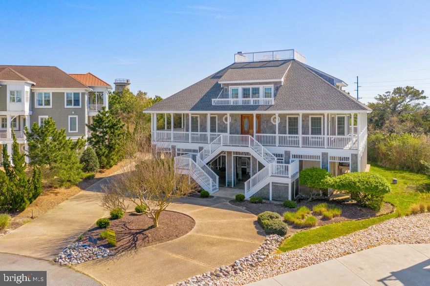 Coastal Home, Private Ocean Side Community and ROOM FOR A PRIVATE POOL!  Are you ready to effortlessly watch sunrises and sunsets over the Ocean and Bay? With nearly a 360-degree combined view of Rehoboth Bay, the Atlantic Ocean and State Park Preservation Area, 33 Hall Avenue is a unique opportunity with  4,000 +/- sq. ft. of space, boasts five bedrooms, five  baths, and is an architectural delight.   This is the kind of home that you never want to leave, yet is very close to all coastal area points of interest. Seize immediate water views from the grand second level entry:  huge great room with masonry fireplace, inviting family room, and a chef's kitchen that flows effortlessly into formal and casual dining areas.  The kitchen is all gourmet: butler/breezeway with side delivery/service entrance, wine cooler, sub-zero refrigerator, gas cooktop, double ovens, and granite counter tops.   Lounge on the expansive wraparound decking, relax on the back screened terrace with water views all day long; or stroll up to the roof top observation deck for total unsurpassed views up and down the coast. Easily take a short walk to the private beach via private seaside walkway. This home is traditionally elegant with graceful oak staircases, oak hardwood floors, solid oak doors, exquisitely tiled showers and baths (including outdoor shower), and atrium center with cupula style stained glass ceiling design as your focal point.  Perfect for broad scale entertaining! Round out the residence with almost   acre cul-de-sac lot/location shrouded by beautiful landscaping, and idyllic seclusion as you hear all that nature has to offer: waves, shore birds, breezes, and more. Attached 2 car garage, storage galore, separate laundry room, and bedrooms with private balconies! The Chancellery is a private ocean front community consisting of just 16 distinctive residences. All homes sprawl across large lots and there is private beach access via secluded boardwalk.