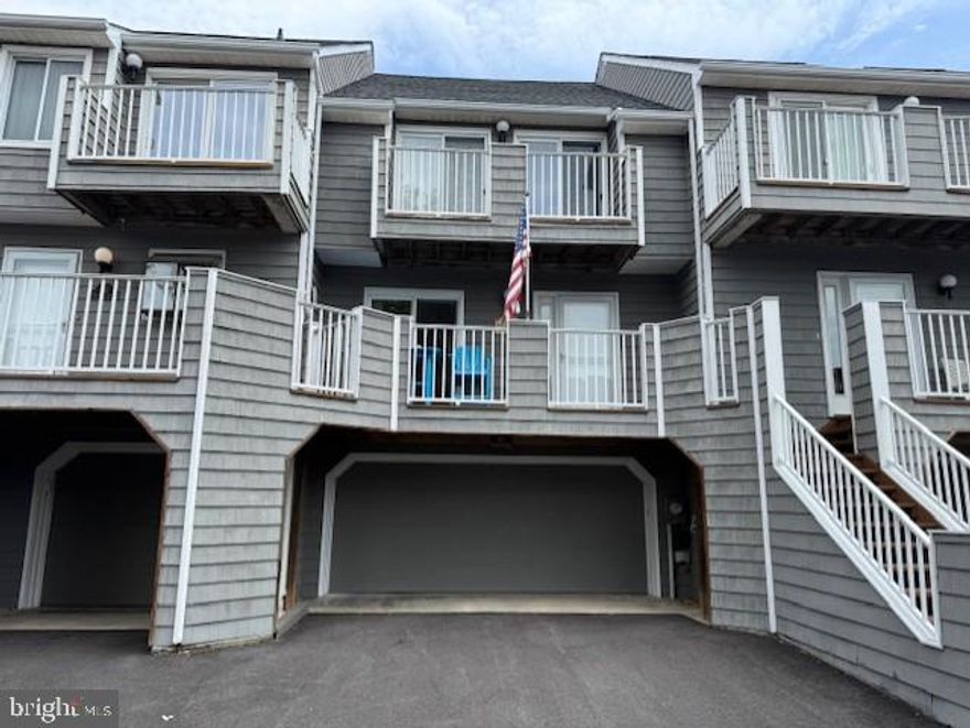 Welcome to beautiful Harbour Island, home of the prestigious White Marlin Open fishing tournament.  This spectacular unit has a great view of the marina and the pool.  Perfect location for watching the boats come in.  This is a very large unit with three bedrooms upstairs and a bonus room in the garage area.  There are many updates.  There is also a boat slip included in the sale of this unit.