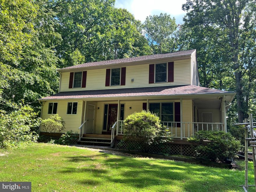 This charming two-story Colonial offers a warm welcome with its inviting wraparound porch and spacious rear deck—complete with a built-in picnic table—perfect for relaxing or entertaining outdoors. Situated on over two low maintenance acres  and just under three miles from Central Park and Spotsylvania Town Center, the property provides convenient access to shopping, dining, theaters, and more.

In addition to its residential charm, this property presents a unique opportunity for a small business. Its central location, generous lot size, and layout offer excellent potential for commercial use, making it an ideal live/work space or office location (subject to zoning approval).

Inside, you'll find beautiful red oak hardwood floors throughout and a country-style kitchen featuring ceramic tile countertops, a center island with a gas range, and handy serving shelves. A newer dishwasher (2–3 years old) adds a modern touch. The cozy family room at the back of the home opens onto the deck via a screened French door, offering seamless indoor-outdoor living. The front room, enclosed with elegant glass French doors, is perfect for a den, office, or client-facing space.

Additional features include:
A monitor for an outdoor video surveillance system (included as-is and removable upon request)
High-speed broadband availability. Owner is providing Air filters and an ice machine.
Two spacious walk-in storage rooms located off the porch and additional storage in the attic
Convenient upstairs laundry area, near all three bedrooms
Newer dishwasher and dryer

Outdoor highlights include a chicken coop for up to six hens, a four-room work shed, and a serene koi pond—all framed by mature hardwood trees. The expansive backyard provides privacy, space, and versatility.

No pets allowed, Two-year lease required, Minimum credit score of 680

Don't miss this rare opportunity to enjoy the comforts of home with the added flexibility of a potential business location.
