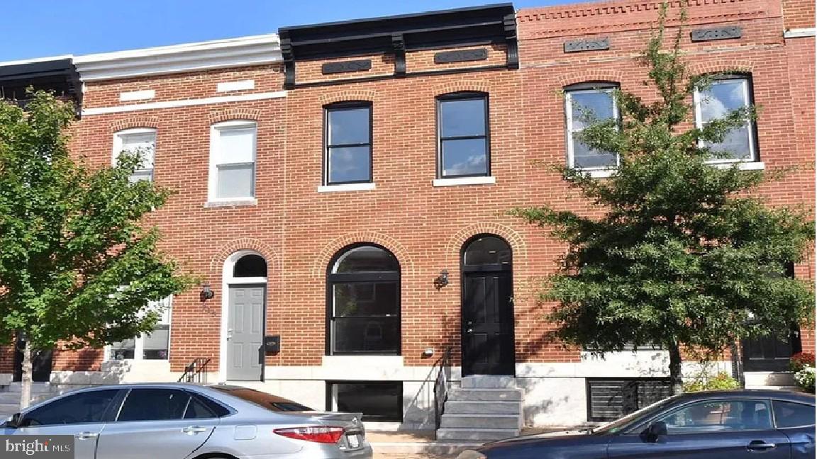 Patterson Park CHAP APPROVED TRUE 3BR (basement w/ walkout), home with PARKING, an absolute must see! Home boasts generous room sizes, abundant natural light, upper level laundry w/ Samsung washer/dryer INCLUDED, restored tin ceilings, clawfoot tub, restored transoms. All new systems, hardwood floors throughout, Quartz kitchen w/ Stainless, hip light-filled rentable basement space with abundant storage! 3 Full Baths! All this on the best street, East! Prime Location: Steps from Patterson Park, minutes to Canton's shops and dining, and easy access to I-95 and downtown Baltimore. This move-in-ready gem on one of East Ave's best streets is perfect for families, professionals, or anyone seeking urban living with style. (CHAP credit until 07/01/2028.)