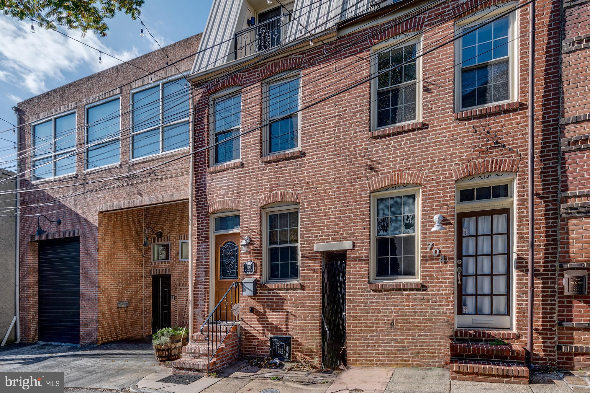 Amazing opportunity to own a 3 level renovated home in Canton proper. The home was uniquely renovated, boasting attention to detail and customization such as custom railings, tray ceilings, hardwood floors, multiple decks, and more. First level features a living room, large galley kitchen, powder room and a separate dining room, with a walk out to the patio. Second floor offers 2 large bedrooms with a walk-out balcony and two bathrooms. Top level is its own master suite with a spacious bedroom with another private balcony and a large bathroom with a soaking tub, separate shower, double vanities, and another walk-out balcony. Located perfectly in the heart of Canton, minutes from waterfront, Canton Square, Fells Point, Harbor East, Johns Hopkins.