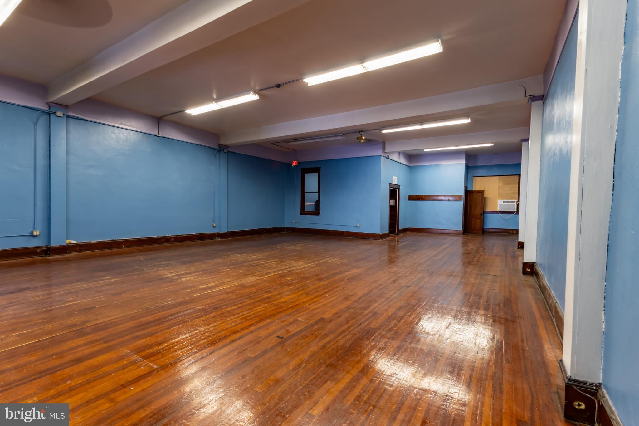 Looking to have a store front or dance studio on 2nd street in Saint Clair? Look no further. This commercial space, with lots of off street parking, is perfect for a brand new or expanding business! This huge space would be great for a dance studio, fitness center, gymnastics center ( TALL CEILINGS), gaming area, event space, office space and so much more! The private room (with piano) can be used for so many things! It also leads out to a private roof top/balcony with a staircase leading to the rear parking lot. There is a bathroom that is included in the largest room. There is an antique rolling double door between 2F (2nd floor, front room) and this listing that can be opened. Rent this room for $925.00 a month or rent the whole 2nd floor for $1,200.00! Seller is actively working on rehabbing the space. Call now for a tour!
Photos by Michala Reber Photography