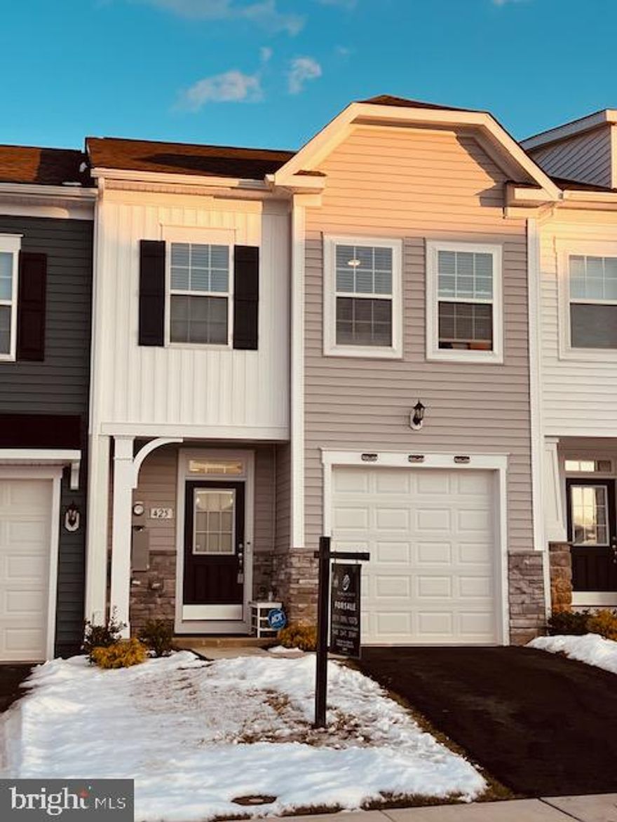 If you are looking to get into new construction but don't want to have to wait for it ... this is the spot ! Beautiful interior 2 level townhome built in Jan 2024 in coveted Martinsburg Station. The owners have added easy clean and stylish new flooring, pendant lighting , decorative tile in kitchen and custom wood decor in bathroom and entryway ceiling. Upstairs is a lovely light filled master suite with full bath with soaker tub as well as walk in shower. There is a one car garage and lots of closets for storage.  Great community close to shopping and filled with amenities for new homeowners to enjoy. 
Please request all showings 2-4 hrs ahead and after12pm  in the afternoon --the owners have dog with anxiety issues. 
All offers should include verbiage "contingent on owner finding new home of choice."