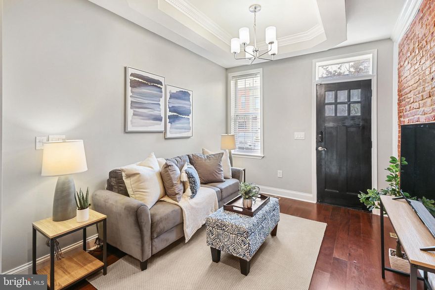 GORGEOUS 3-STORY RENOVATION NOW AVAILABLE LOCATED IN THE HEART OF CANTON! GLISTENING HARDWOODS CASCADE THROUGHOUT. ENJOY CUSTOM WHITE CABINETRY, UPGRADED TRIM AND PAINT PACKAGE, IMPORTED TILE, RECESSED LIGHTING, GRANITE COUNTERTOPS, SS APPLIANCES IN DESIGNER CHEF'S KITCHEN WITH POT FILLER. EXPOSED BRICK. COFFERED CEILINGS. LOADS OF NATURAL LIGHT. FINISHED LOWER LEVEL. HIGH CEILINGS. TONS OF STORAGE. WALK-IN SHOWERS. WALK-IN CLOSETS. SPACIOUS 4 BEDROOMS WITH 3 FULL BATHROOMS. THREE ABOVE-GRADE BEDROOMS. DUAL MASTER SUITES. 3RD STORY INCLUDES INTERNAL ACCESS TO THE ROOF DECK WHICH ALSO INCLUDES A CUSTOM BEVERAGE CENTER. FINISHED BASEMENT IS GREAT FOR A HOME OFFICE, GYM, LIBRARY, OR PLAY ROOM. EXPANSIVE ROOF DECK FOR ENTERTAINING - INCREDIBLE WATER AND CITY VIEWS. CLOSE PROXIMITY TO RETAIL SHOPPING, LOCAL DINING, PATTERSON PARK, AND ALL MAJOR HIGHWAYS. SCHEDULE A PRIVATE TOUR TODAY.