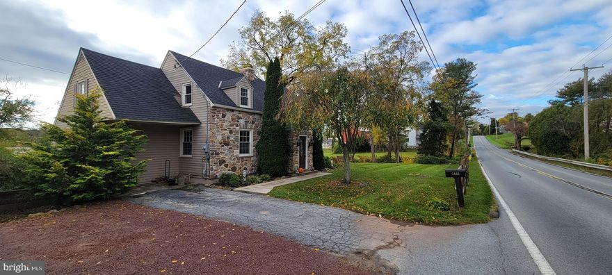 Freshly painted and refinished, new stone facade on house, chimney and garage. Roof, heating/air and water heater recently installed. 12 X 20 shed with electric, cable and new roof. Stone fireplace in living room and chimney setup for wood stove in basement. 3 BR and bath up with 1/2 bath off breakfast nook. Sunroom and deck overlook your large back yard, stream and the adjacent large vineyard. Closets (1 Cedar) and additional storage in the gables. 
This is your opportunity for country living within minutes of the shopping centers and Municiple offices.  your taxes don't reflect all the cosmetic improvements and you've got the benefit of the Exeter school system. 
Come see all this delightful home has to offer.