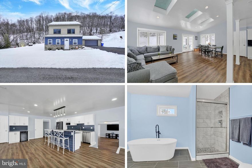 This is not a drive-by! You must see inside this gorgeous 2023-renovated gem to appreciate the incredible space and elevated comfort it offers! Situated on a peaceful .63-acre, partially wooded lot on a rural township road, this home has been meticulously prepared for its next owners with high quality finishes and upgrades for style, durability and peace of mind. Enter through a bright foyer with ample space for a drop-zone and French doors to the home office or den. An expansive main level is revealed as you step into the generous living room with large picture windows and an adjacent full bath with custom ceramic tile shower. The heart of the home is a sun-drenched great room uniting the open kitchen, dining and family room areas, boasting vaulted ceilings, skylights, and panoramic forest views. The gourmet kitchen is a chef’s delight with granite counters, soft-close cabinetry, stainless appliances, and a huge walk-in pantry. French doors lead to a stamped concrete patio outside, ideal for watching local wildlife, warm weather gatherings and dining al fresco. The unique split-level layout offers the perfect blend of privacy and connectedness. The upper-level primary retreat features gorgeous views, a massive walk-in closet, and a deluxe en-suite with free-standing tub, dual vanity, and custom walk-in tile shower. Two additional bedrooms sharing a full bath are located on their own level. Other highlights include low-maintenance LVP flooring, dual-zone HVAC, a 2-car garage, Baker-waterproofed basement, and a powered outbuilding/workshop. Starlink high-speed internet ready, and conveniently located for easy access to major commuter routes, York, Hanover and Baltimore! Welcome home!