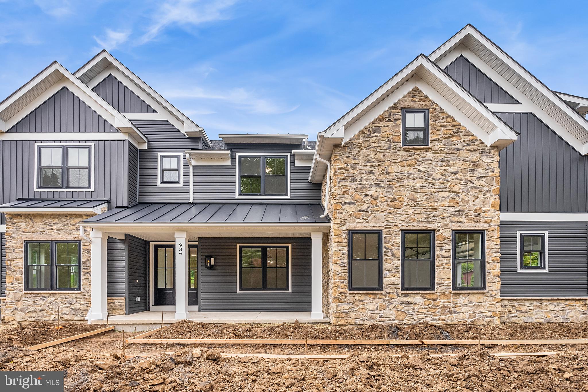 QUICK DELIVERY - by the end of June 2023!!!
We are under roof - Welcome to The Homestead Model at Sandy Run Ridge Circa 2022 Modern Farmhouse. New Construction. Equal parts casual and chic. This is the epitome of elegant yet comfortable living. This 4- bedroom new construction home sits on a picturesque lot in prestigious Bucks County, located within walking distance to downtown historic Yardley Borough, restaurants, shopping and The Yardley Country Club. A little bit country, A little bit Industrial and...a whole lot of white paint. Neutral hues, wood accents and clean lines Let's begin our tour outside- 30 yr architectural roof shingles with standing seam modern farmhouse metal roof accents. Mix of vertical, horizontal and shaker craftsman white board and batten maintenance free siding, -spotlighting white tundra brick with contrasting dark exterior windows. Front porch highlights 6 x 6 architectural craftsman columns with upgraded boxed beam trim. Look above front porch to see beaded board under front porch. Artisan Industrial barn exterior lights flanking exterior glass double entry doors and above the 2-car side entry garage. Step inside to find -attention on blending rustic moments with sleek accents. Dramatic 9" high ceilings abound on first floor and 8"ceilings on second floor, solid oak-stained staircase with painted risers-artful spaces and plank floors abound. This spacious home boosts the open concept living with every amenity on one's wish list: home office/den, gourmet kitchen w/ extended island, granite/quartz counters, white shaker style soft close cabinetry, SS appliances, pendants above island, walk in pantry, under cabinet lighting package, gourmet kitchen hood vented to exterior. kitchen eating area opening up to exterior for your alfresco dining. Expansive family room with board and batten floor to ceiling accented fireplace wall w/ direct vent propane burning fireplace. Extended mud room/drop zone with storage space galore. Second level laundry room. Second level highlights: Owners Suite with all the luxury of your favorite hotel-no reservations required. Headlining dual door foyer entrance into owner's suite with dramatic coffered ceiling, expansive closet, large walk-in shower and dual vanities. Show stopper free standing soaking tub. A space you will never want to leave. In addition to hall bathroom, 4th bedroom has an adjoining private full bath. This home is packed with all the extras on one's wish list. Fresh. Clean & totally current. A prime commuting location within minutes from I-95, Route 1 and 15 min from the Princeton Route 1 corridor and trains to New York City. Go Ahead Fall in Love... This is Happily Ever After ... Still time for buyer to make some selections.
Please see documents section Exhibit B#1, B#2 and B#3 for BUILDER UPGRADES INCLUDED in the asking price !
Currently there are (2) side by side homesites. This is lot #2. Please do not walk on to 936 Sandy Run as it has been sold. Please do not disturb the new homeowners.