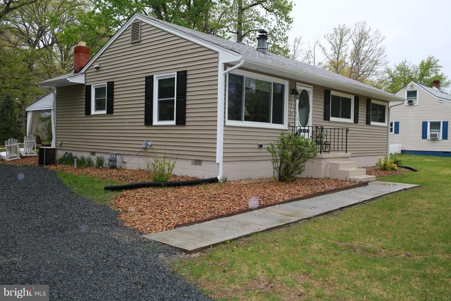 Charming, updated home boasts original Ferry Farms character. No HOA! Brand new siding and energy-efficient windows with fully transferable warranty. New gutters, refinished original hardwood floors, fresh paint, newer appliances, furnace, hot water heater, updated bathroom, and beautiful stone fireplace make this home move-in ready. Relax on the covered patio, overlooking the large back yard.