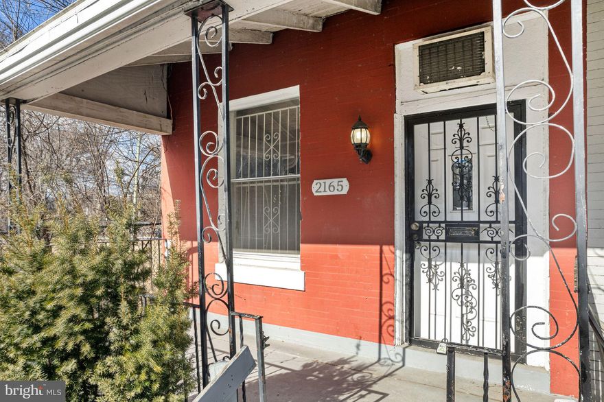 An incredible investor or owner-occupant opportunity near La Salle University! Located just one block from La Salle and close to Central High School, 2165 W Grange Ave sits in a high-demand rental area with strong tenant potential. Nearby amenities include Fresh Grocer, Dunkin’, Wingstop, and The Shops at La Salle, plus easy access to public transportation and major roadways. The property features a covered front porch and an updated interior with laminate hardwood flooring throughout. The open living and dining areas lead to a functional kitchen equipped with granite countertops, white cabinetry, and stainless steel appliances. The backyard offers additional outdoor space!  Upstairs, there are three bedrooms with laminate flooring and closet space, plus a full bathroom with a tub/shower combo. The full basement provides ample storage and washer/dryer hookups, adding convenience. With great bones and a prime location, this property offers solid potential for an owner-occupant or an investor seeking strong returns. With a high CAP rate and room for value-added improvements, some sweat equity can go a long way. Sold as-is, where-is, condition