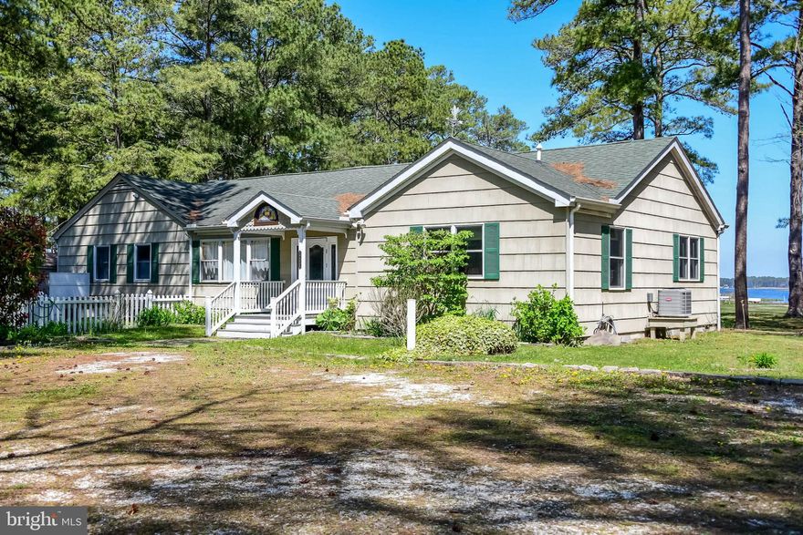 Amazing Opportunity!  Beautiful property on Herring Creek in West Ocean City.  Panoramic long views down the creek and forever wooded views across the creek to the Herring Creek Nature Park.  Existing home was enlarged and updated in 1986 and 2008.  Large Waterview Great Room, 3 Bedrooms, 3 Full Baths, and a Large Screened Porch.  Property also includes 6 Seasonal Rental Cabins and 9 Boat Slips. ** 2022 Rental Income is $49,500.*  Great development potential on the one of a kind waterfront property. 
 If you've been looking for a tranquil West Ocean City location this is a MUST SEE!**Tax records do not reflect total SF.