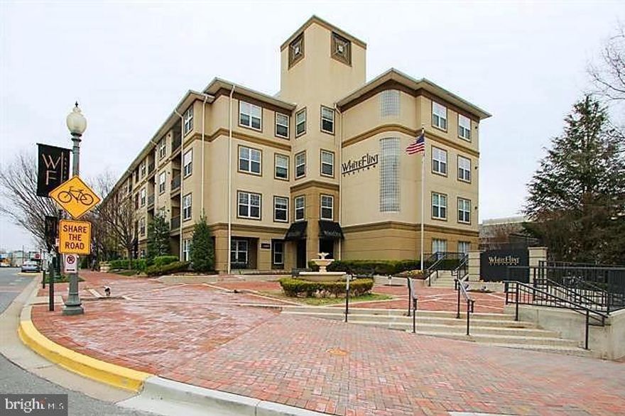 Call listing agent for convenient instructions to find unit which is located near rear community.  Beautiful 2 Bed / 2 Bath condo conveniently located in the heart of North Bethesda.  One block from White Flint Metro Station (Red Line).  2 miles from 270/495, and 11 miles to downtown Washington D.C.  Close proximity to  Harris Teeter shopping and Pike & Rose. Hardwood floors, stainless steel appliances, spacious closet space and bathrooms.  Built in shelving in living room and bathrooms.  Balcony,  convenient side entrance from Chapman Ave.  BBQ set-up and courtyard just outside unit.  1 parking spot in covered parking structure.  Community Room, business center, exercise room, and pool.  All the convenience you need!