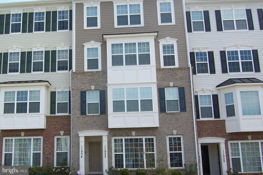 JUST REDUCED**PRICED TO SELL** Will Not Last Long** GORGEOUS 2 Level Condo Townhouse with 1 Car Garage offering up to 2611 sq. ft. Featuring 3 Bedroom, 2.5 Baths, Gleaming Hardwood Floors, Fireplace, Granite Counter Tops, Stainless Steel Appliances, Upper Level Washer and Dryer with Utility Sink, Crown Moldings, Master Bedroom with Walk in Closet FHA Approved. The list goes on. Ready to Move in
