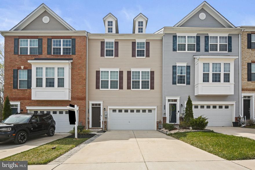 Convenience, functionality, and style converge in this exquisite 3 Bedroom, 2 Full, and 2 Half Bath Townhome nestled in The Preserve at Windlass Run community. Step into a haven adorned with gleaming Hardwood Flooring seamlessly adorning most of the home. The journey continues to a stunning Kitchen boasting Upgraded level 4 Granite countertops, elegant wood 42-inch cabinets, captivating tile backsplash, and top-of-the-line stainless steel appliances on the main level. The spacious Living Room beckons with abundant natural light pouring in through Sliders leading to the Rear Deck, offering serene views of the Rear Fenced Yard. A charming Dining Area, convenient Half Bath, and coat closet complete the Main Level, ensuring effortless living. Ascend to the Upper Level, which features plush carpet flooring throughout, 2 bedrooms, and a luxurious primary bedroom boasting a walk-in closet, an attached full bath with seamless glass shower with rainfall shower head, and a double vanity adorned with granite countertop. Moreover, revel in the features of the Vienna floor plan by Beazer Homes, including a Premium lot backing to the woods, Energy Star certification ensuring efficiency, and advanced amenities such as Home theater surround sound pre-wire (5.1) in the basement and In-wall HDMI/Ethernet/Power CAT6 Ethernet cable in the Family Room, Basement, and Master Bedroom. This remarkable home epitomizes Move-In Ready living, offering the perfect blend of comfort and sophistication.