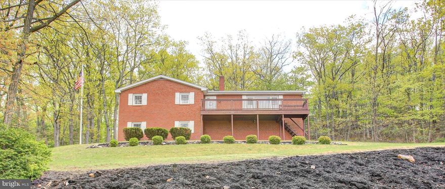 Live where the views never get old—your mountain retreat awaits!  Welcome to 232 Mount Union Rd, beautifully situated in the desirable Greene Knolls community. This all-brick, well-kept home offers 3,600 square feet of thoughtfully designed living space, featuring 3 bedrooms, 2.5 bathrooms, and two fully operational fireplaces—perfectly blending comfort, space, and privacy. The main level welcomes you with an oversized two-car garage, a spacious family room, a versatile bedroom or home office, a half bath, and a generously sized laundry room. Upstairs, you’ll find a bright and open layout including a large kitchen, separate dining room, and an inviting living room with a fireplace and breathtaking panoramic mountain views. This level also features the primary suite, a third bedroom, and a full hallway bath. Enjoy peaceful outdoor living from your private backyard patio, or unwind on the front deck while taking in stunning valley views. Come see the quality and care this home has to offer you. Don’t miss your chance to turn mountain living into your reality...Schedule your showing today!