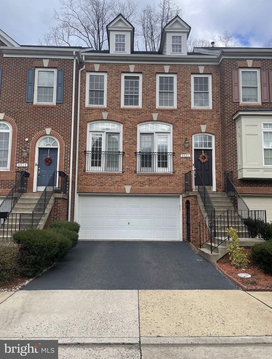 The paint colors have been neutralized!  Main level with hardwood floors, a coat closet, a foyer with a chandelier, and a two-story ceiling.  Main level Powder room. Living Room with recessed lighting, double French doors with blinds, and crown molding. The dining room has a chair rail and crown molding, and a chandelier with a ceiling medallion. Kitchen with stainless steel appliances with gas cooking, granite counters with breakfast bar, tile backsplash, pantry, space for cafe-size table and chairs, and recessed lighting. Large 350 square foot Trex deck backing to trees. Family room off of kitchen with recessed lighting and ceiling fan. Master bedroom with hardwood floors, three windows, walk-in closet with professional closet organizers, and full bath with soaking tub, medicine cabinet, separate tub, and water closet. The Hall bathroom has double sinks, a medicine cabinet, and a shower/tub combo. Upstairs hallway with linen closet and recessed lighting. Laundry Room with Front Loading washer and dryer and built-in shelf.  Bedroom #2 with hardwood floors, closet with professionally built-ins, and two windows with wood blinds. Bedroom  #3 with a closet with professionally built-ins, hardwood floors, and windows with wood blinds. Lower level with Bedroom #4 with closet, recreation room with gas fireplace, and full bath.  Walk out to a large patio. Two-car garage with storage closet and extra refrigerator. Community pool, fitness center, rental party room. Close to Fairfax Corner, Fair Lakes, Fair Oaks Mall, Fairfax County Parkway, Fairfax County Government Center, and 66.