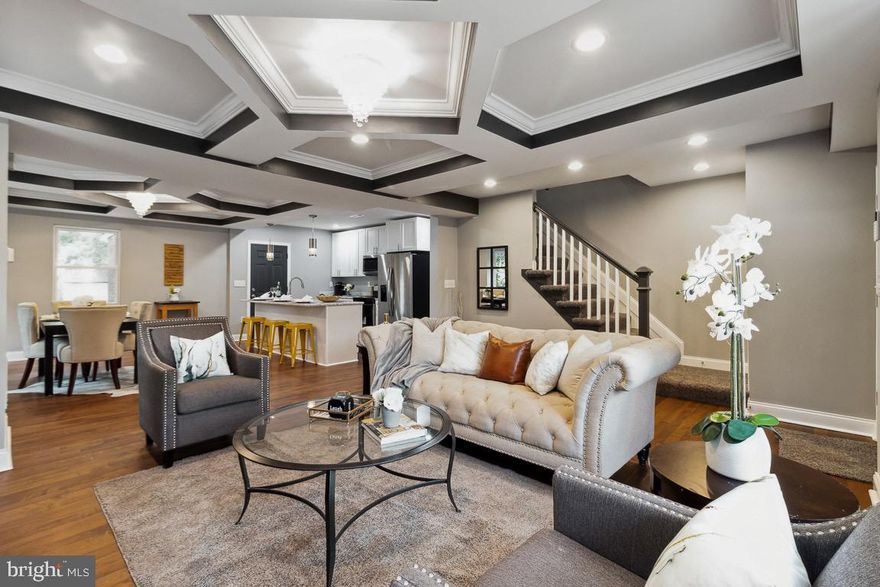 Meet Mary...a masterpiece renovation located in the "Walther" neighborhood. This Semi detached townhome has all the bells and whistles of a band new custom built home.. Walk in and be amazed by the open floor plan, coffered ceilings, tons of natural light and unique bamboo flooring. The kitchen is made for the "chef" of the house with all new stainless steel appliances, and cabinetry. Walk out to the enclosed porch and enjoy warm winter nights. The gigantic back yard can be used for tons of summertime fun. The lower level is fully finished with a full bath, room for entertaining and 2 rooms that can be used as bedrooms or offices. The upper level has nice sized bedrooms and a custom main bath. There is a driveway that can hold up to 4 cars, and plenty of street parking..Accessible to Towson, 695, I95 and minutes to downtown Baltimore... Mary is waiting for you!!..Schedule a showing, and Bring an offer today...