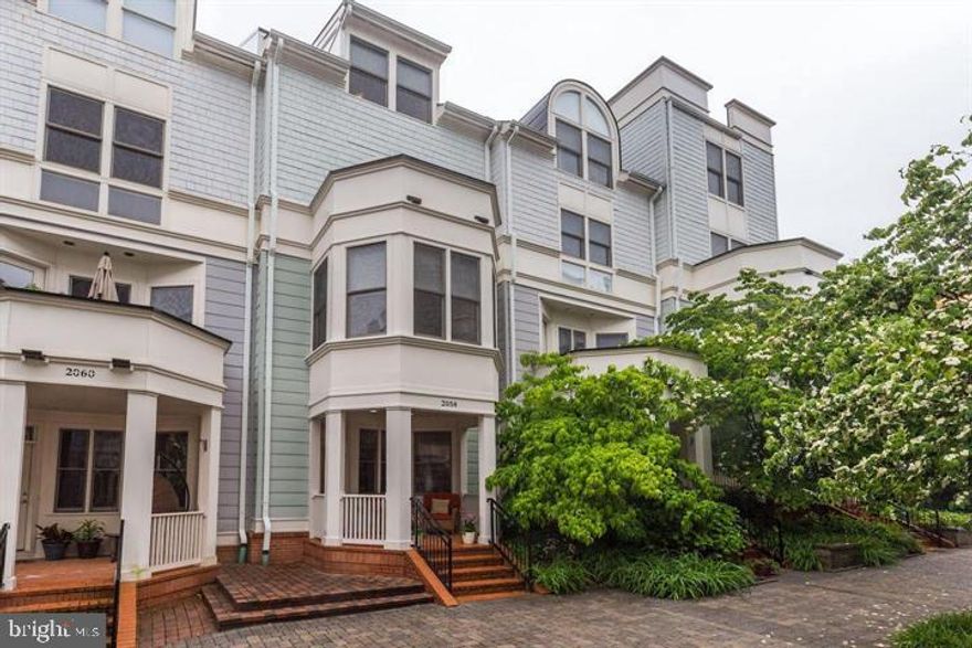 STUNNING Townhome in Prime Arlington Location – Available Now

Welcome to 2058 North Oakland Street – a beautifully maintained and spacious 4-bedroom, 3-bath townhome tucked away on a quiet alcove just minutes from the Metro and I-66. This elegant home features sun-drenched living spaces, hardwood flooring, and tasteful neutral paint throughout.

The entry level offers versatility with a private office or bedroom, a full bathroom, and direct access to the two-car garage. Upstairs, you'll find a bright and open living and dining area with a cozy fireplace, along with an updated kitchen featuring granite countertops, stainless steel appliances, and a breakfast bar.

The third level is dedicated to an expansive primary suite, complete with a generous sitting area, walk-in closets, and a luxurious en-suite bathroom. The top floor offers two additional spacious bedrooms, a full bath, and a convenient laundry area.

Additional highlights include:

- Private porch for outdoor relaxation

- Bay windows and custom built-in cabinetry in the living room

- Wall-mounted TVs in the office, family room, and primary bedroom

- Ample storage and closet space throughout

Pets considered on a case-by-case basis. Don’t miss this rare opportunity to live in a light-filled, thoughtfully designed home in one of Arlington’s most desirable neighborhoods.