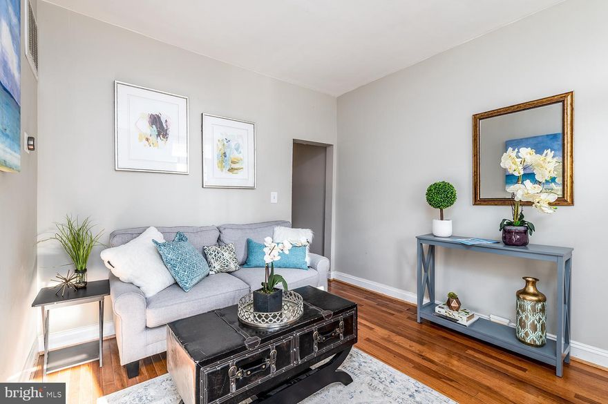 On the corner of Hampden's magical 34th street, the location could not be more perfect.  Awesome 3bedroom and 1 full bath with PARKING is now available. The property has been fully updated, featuring hardwood floors on the main level, cozy living room, spacious dining room opening into the fully updated espresso shaker kitchen with granite counter tops and stainless steel appliances. Upper levels offer large bedrooms and a beautiful bathroom. The property sits on an unusually large lot - a fenced-in yard, with a 1-car parking pad in the back.