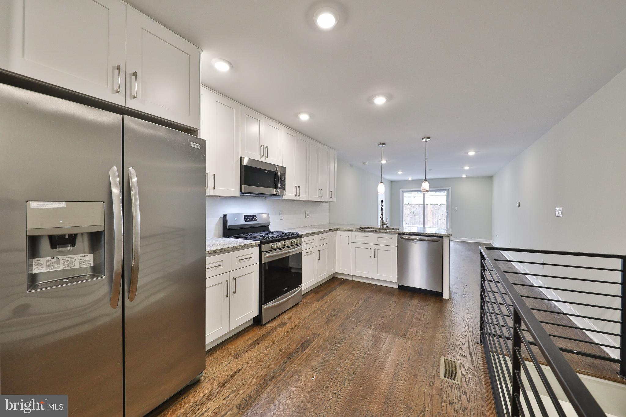 Be the first to occupy this smartly renovated 2 bedroom/ 2 bath bi-level unit in this boutique three-unit condominium building in Fairmount. With its desirable location near all that is happening on the eastern end of Fairmount Avenue and the Avenue of the Arts North, it's but a short walk from Center City. The unit itself, with nearly 1400 sq ft of finished living area, has everything today's discerning buyer seeks: an open layout, fine finishes, thoughtfully designed kitchen and bathrooms, and a large outdoor space. The kitchen, with its white shaker cabinets, quartz countertops, carerra marble backsplash, & stainless steel appliances, flows seamlessly into the living room, making it a great area in which to entertain. Down the hall is a large bedroom and a hall bathroom featuring contemporary porcelain tile and neutral pallets . On to the lower level where you'll find the second bedroom, another full bath, a den area and the laundry closet. A large patio off of the living room is the capstone of this fine unit. Taxes and condo fees are estimated.