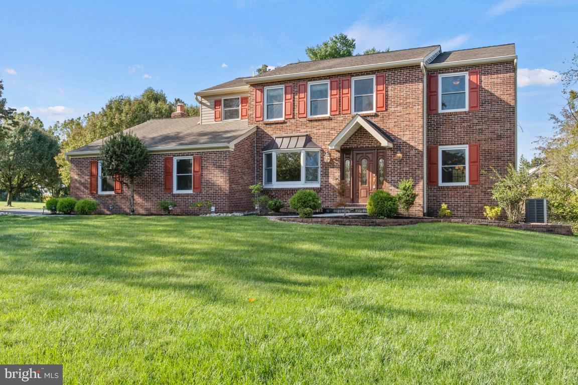 Enjoy this well-maintained, spacious brick colonial on .46 acres of a corner lot on a quiet cul-de-sac in the Durhan Lea neighborhood. Landscape lights enhance the large lot. The center foyer welcomes you home with two spacious rooms on either side providing numerous options for the homeowner: sitting room, dining room, home office, playroom, to name a few. To the right, the sunny room's back door opens onto a large deck. The room to the left has a bay window to brighten it and a hinged door opening into the kitchen. There are hardwood floors throughout the first level. A convenient powder room with a Corian counter-topped vanity is at the end of the foyer. A modern kitchen features granite countertops, custom tile backsplash and is open to the great room where you can relax in front of the propane fireplace. The fireplace is set in a brick wall that stretches to the vaulted ceiling, recessed lighting, a fan with light and a sky light. Watch TV or enjoy the backyard view through the combination window and windowed door. Second floor has four bedrooms and two full bathrooms, one of which is in the primary bedroom and has a granite countertop on the vanity. The hall bathroom has a Corian countertop on the vanity. There is a shed on the property that was built on a slab and electricity was installed. Award-winning Council Rock Schools. Additionally, Duham Lea has open space and a scenic walking path to Helen Randle Community Park. You will appreciate this quiet neighborhood with no through streets.