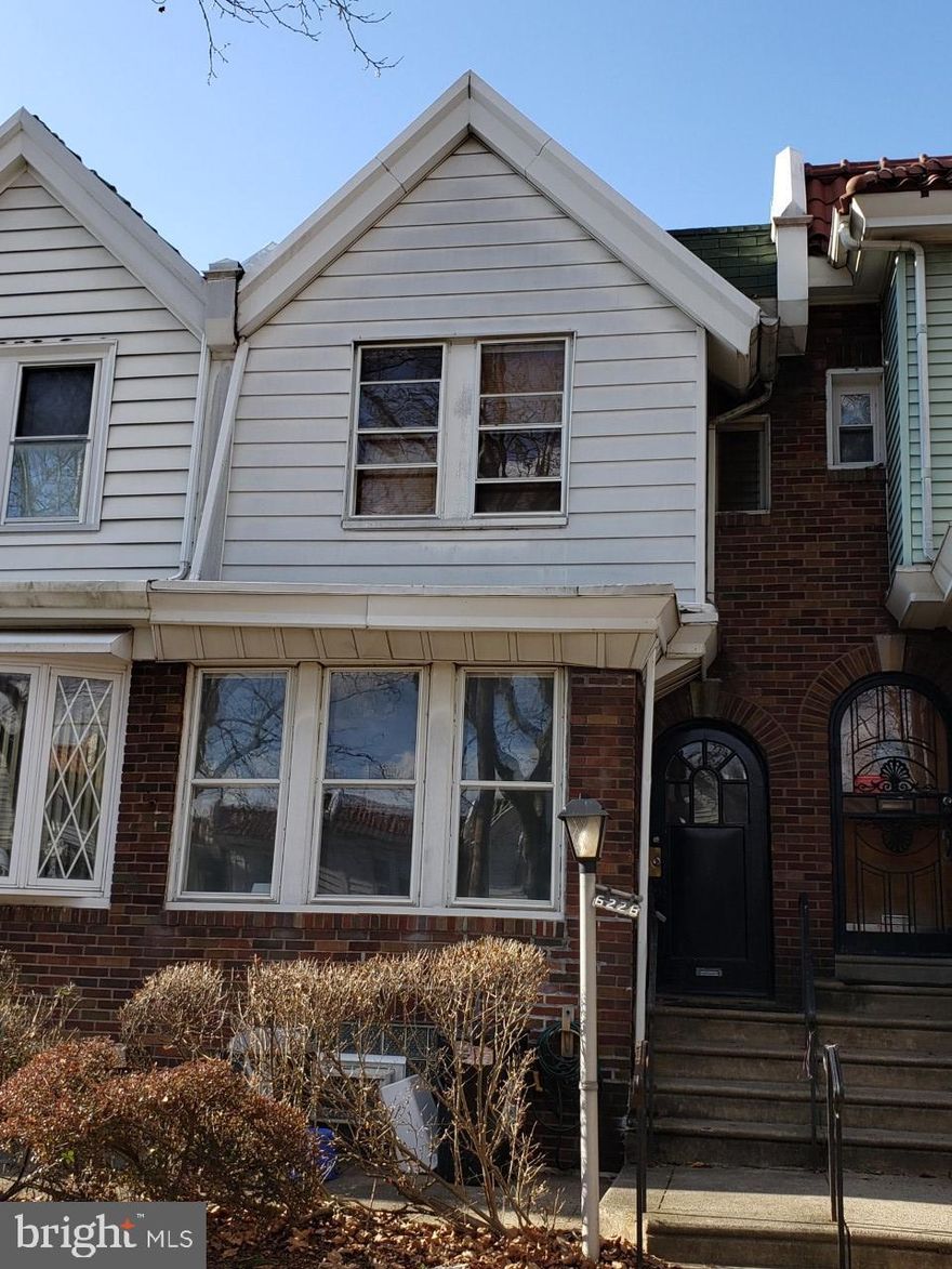 Beautiful tree-lined street in East Oak Lane, Philadelphia s little suburbia. This spacious 1 bed, 1 bath home has plenty of natural light, a large deck, and garage parking. The kitchen is complete with a dishwasher, a gas stove, and plenty of cabinet space. Your covered deck is perfect for entertaining whether rain or shine! The partially finished lower level has its own entrance, washer & dryer, as well as a finished flex room which can be converted to an additional bedroom, workout room, storage, or den. With a 3 minute walk to the Fern Rock Train Station, this home has the convenience of easy transportation to Center City!