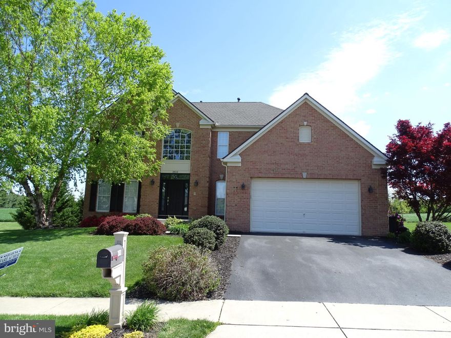 Gorgeous 2 Story Colonial Home backing up to open farm land!!!  Situated on a well manicured lot with a stamped concrete patio, and a shed.  The views from the back yard are remarkable.  Entering the foyer you will be greeted by hardwood flooring, a 2 story ceiling, New chandelier, and a coat closet.  Half bath with hardwood floor and pedestal sink. Office with carpet flooring, crown molding, chair rail and wainscoting. Dining room with carpet flooring, crown molding, chair rail and walk out bay window. Family room with carpet flooring and gas fireplace with mantel. Main floor laundry with vinyl flooring, sink, washer and dryer. Breakfast room featuring hardwood floor, cathedral ceiling, ceiling fan, circle top window and French doors leading out to stamped concrete patio. Eat in kitchen with hardwood flooring, recessed lighting, island, pantry, Corian countertops, double oven, electric cooktop, dishwasher, garbage disposal and refrigerator. Ascending to the second floor you will find a Primary bedroom with carpet flooring, ceiling fan and walk in closet. Primary bathroom with ceramic tile flooring, ceramic tile corner shower, soaking tub and double vanity. Bedroom 2 with carpet flooring and ceiling fan. Bedrooms 4 and 5 both with carpet flooring and closets. Hall bath with vinyl flooring  and 60'' vanity.  Going down to the basement there is a half bath with vinyl flooring.  A large Rec room with carpet flooring, recessed lighting and egress window. Office with carpet flooring and recessed lighting.  The 2 car garage is oversized with a separate storage area to the back of the garage.   This home has been impeccably maintained, and is ready for it's new owner.  To many upgrades to list, must see to appreciate!!!