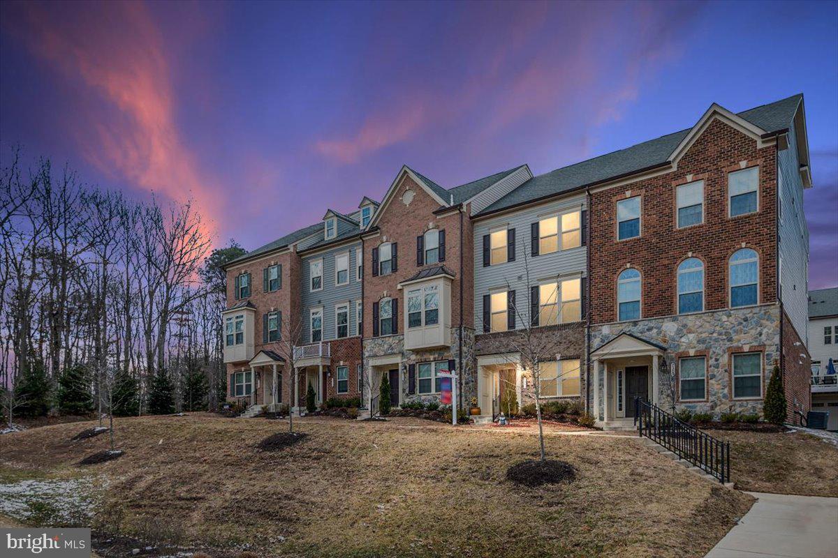 Don't miss out on this sought after community of Parkside.!! This is a commuters dream; easy access to MD 295, MD 32, I/S 95. Enjoy the Community Club House with a gym and pool. This home is move in ready! Built in 2017, everything is practically new! Featuring 3 bedrooms and 2.5 bathroom, this home has so much to offer. As an added bonus, a 10 foot extension has been added to the back of the home and 9 foot ceilings throughout. The main floor features a front door entry with a sitting room/office, storage room and access to a 2 car garage. Walk up the beautiful hardwood stairs to a gorgeous living area. The beautifully appointed kitchen features black cabinets, spacious pantry, stainless steel appliance, gas stove top and stunning authentic moracin back splash. Adding to the charm are pendulum lights above the island. Off the kitchen is a nice dinning room and a huge family room with a fire place , recessed shelving and a deck to enjoy the neighborhood.
Up another flight are 2 comfortable bedrooms with a hall bathroom to share and a large master bedroom. The master bedroom has two walk-in closets and en-suite with two sinks, spa tub and separate shower. No running up and down the stairs to carry laundry, step out of your room change the loads..... HURRY AND PUT YOUR OFFER IN BEFORE IT IS TO LATE..!!
