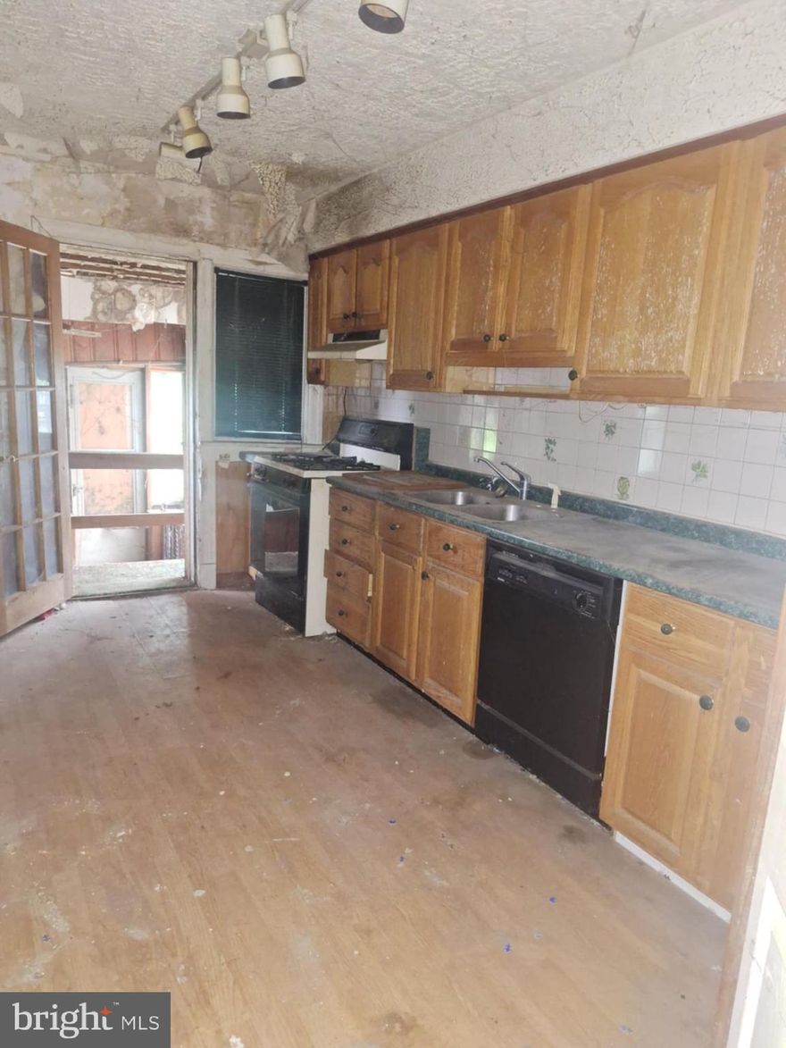 Fantastic investment opportunity available at 2649 West Lafayette! Option to fix up and rent out, resell or for a savvy homeowner that's looking for some sweat equity! There are 2 bedrooms upstairs and a full bathroom. There is an addition in the rear plus a spacious deck above. The partially finished basement has a rec room and a full bathroom.  Large back yard with potential parking pad. This home is being sold as is and seller will make no repairs. Utilites are off at the property and will not be turned on so bring a flashlight when viewing. Buyer to verify ground rent information is correct.