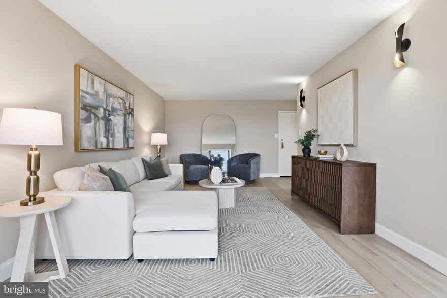 Welcome to Votre Maison!

This stunning condominium has been completely reimagined by Renowned Northern Virginia builder, blending luxurious French-inspired accents with top-tier modern upgrades. From the moment you step inside, you'll notice the impeccable attention to detail: brand-new 7-inch luxury vinyl plank flooring throughout, fresh paint, new molding, new doors, new air vents, and a sleek new thermostat. The spacious living area opens to a large SOUTH-FACING balcony—ideal for soaking up natural light and perfect for feng shui design enthusiasts. Floor-to-ceiling windows and a sliding door flood the home with sunshine, creating a warm and inviting atmosphere.

The chef’s dream kitchen is a showstopper, featuring a stunning quartz island with waterfall edges and a chestnut wood acoustic panel that doubles as a desk or extra seating space for gatherings. You'll find all-new LG ® appliances, including a stove, microwave, refrigerator with water filter, dishwasher, and wine rack. The new cabinets, hardware, light fixtures, and sink with a modern faucet and soap dispenser complete this culinary haven.

Down the hallway, you'll find a brand-new washer and dryer, leading to a fully renovated spa-like bathroom that offers a true retreat. The generously sized bedroom is designed for comfort and can easily accommodate a king-sized bed.

This move-in-ready condominium also comes with an impressive list of amenities: a swimming pool, fitness center, tennis courts, party room, and much more. The $829.10 monthly condo fee includes water, electricity, and gas, and residents enjoy the convenience of a parking decal, additional storage (A- 531), and a secured FOB entry system with 24/7 concierge service for peace of mind.

Centrally located, this property offers unbeatable access to the best of Northern Virginia and the D.C. metro area. It's just 10 minutes from the West Falls Church Metro Station, 5 minutes to Trader Joe’s, and 4 minutes to Starbucks, with nearby EV charging stations and countless dining and shopping options, including Tysons, Mosaic District, and Arlington.

This condominium isn't just a home—it’s a lifestyle upgrade waiting for you!