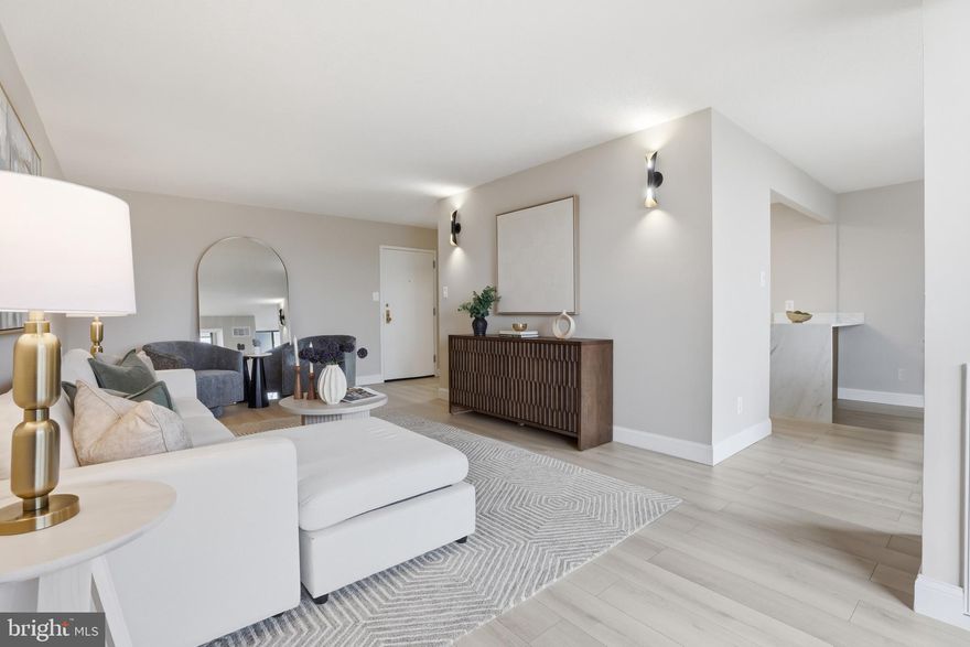 Welcome to Votre Maison!

This stunning condominium has been completely reimagined by Renowned Northern Virginia builder, blending luxurious French-inspired accents with top-tier modern upgrades. From the moment you step inside, you'll notice the impeccable attention to detail: brand-new 7-inch luxury vinyl plank flooring throughout, fresh paint, new molding, new doors, new air vents, and a sleek new thermostat. The spacious living area opens to a large SOUTH-FACING balcony—ideal for soaking up natural light and perfect for feng shui design enthusiasts. Floor-to-ceiling windows and a sliding door flood the home with sunshine, creating a warm and inviting atmosphere.

The chef’s dream kitchen is a showstopper, featuring a stunning quartz island with waterfall edges and a chestnut wood acoustic panel that doubles as a desk or extra seating space for gatherings. You'll find all-new LG ® appliances, including a stove, microwave, refrigerator with water filter, dishwasher, and wine rack. The new cabinets, hardware, light fixtures, and sink with a modern faucet and soap dispenser complete this culinary haven.

Down the hallway, you'll find a brand-new washer and dryer, leading to a fully renovated spa-like bathroom that offers a true retreat. The generously sized bedroom is designed for comfort and can easily accommodate a king-sized bed.

This move-in-ready condominium also comes with an impressive list of amenities: a swimming pool, fitness center, tennis courts, party room, and much more. The $829.10 monthly condo fee includes water, electricity, and gas, and residents enjoy the convenience of a parking decal, additional storage (A- 531), and a secured FOB entry system with 24/7 concierge service for peace of mind.

Centrally located, this property offers unbeatable access to the best of Northern Virginia and the D.C. metro area. It's just 10 minutes from the West Falls Church Metro Station, 5 minutes to Trader Joe’s, and 4 minutes to Starbucks, with nearby EV charging stations and countless dining and shopping options, including Tysons, Mosaic District, and Arlington.

This condominium isn't just a home—it’s a lifestyle upgrade waiting for you!